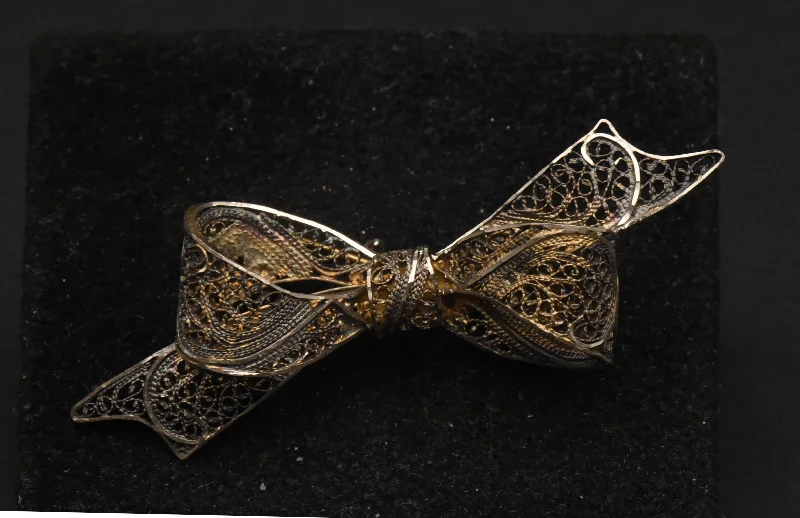 ladies gold brooch wave patterns -Vintage Filigree Tied Bow Brooch