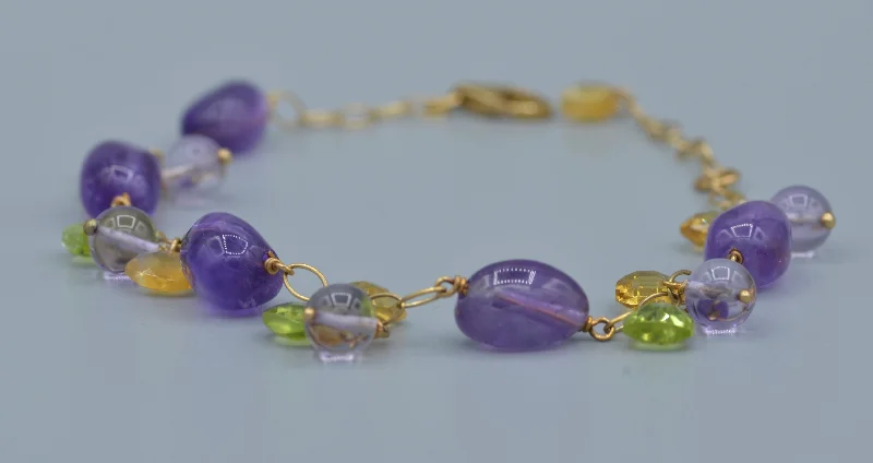 Ladies sleek deco bracelets -14K yellow gold 7" bracelet with Amethyst, Peridot and Citrine dangles from the gold links