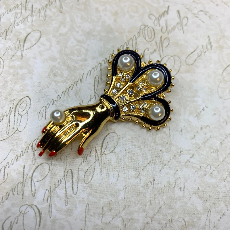 ladies gold brooch intricate patterns -Hand with pearls brooch