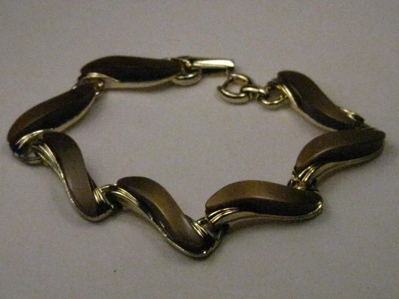 Ladies dusk gleam bracelets -Vintage Gold Tone Brown Thermoset Bracelet, 7", Wavy Links, Mocha colored, 1950's/1960's