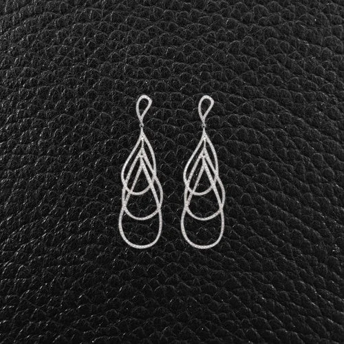 ladies earrings geometric cuts -Teardrop Shaped Diamond Dangle Earrings