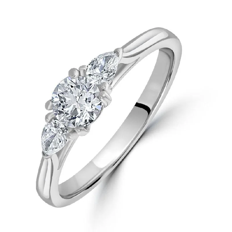 infinity design rings for women -Platinum Round Brilliant Cut and Pear Shaped Diamond 3-Stone Ring