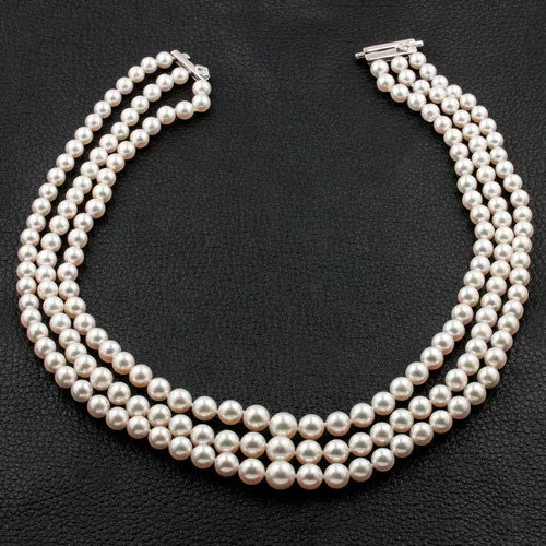 Ladies thin titanium necklaces -Triple Strand Pearl Necklace