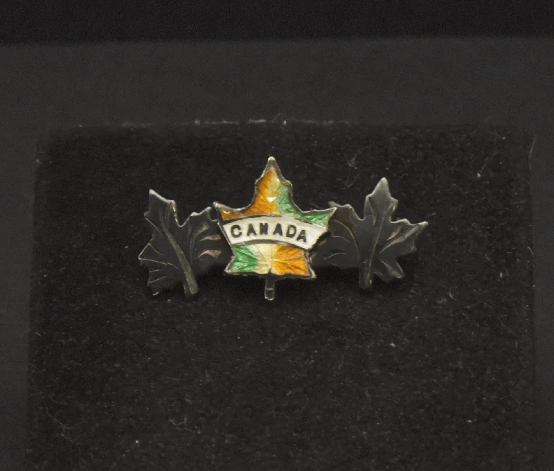 ladies gold brooch lotus motifs -Vintage "Canada" Sterling Silver Guilloche Enamel Maple Leaf Brooch