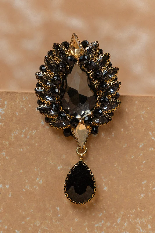 ladies brooch diamond cut edges -Black Crystal Brooch With Drop Detailing