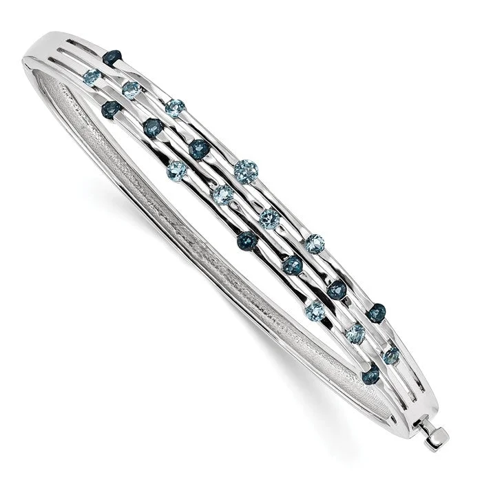 Ladies warmth charm bracelets -Sterling Silver Light Swiss and London Blue Topaz Hinged Bangle Bracelet