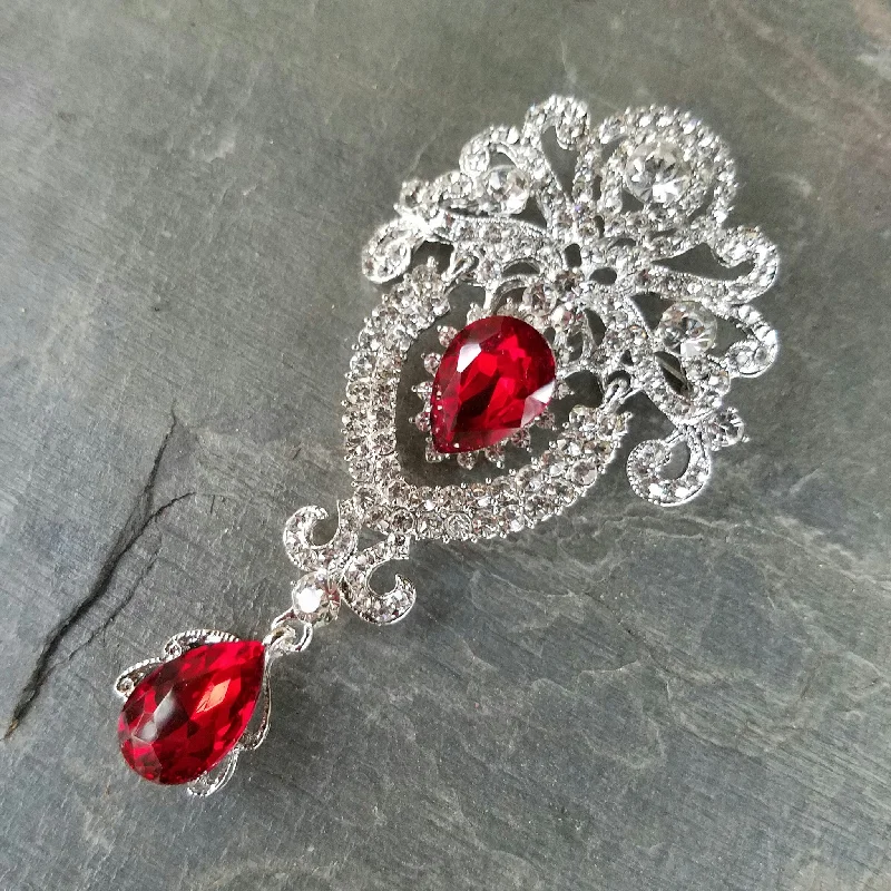 ladies gold brooch bird motifs -Dangling Red and Clear Rhinestone Brooch